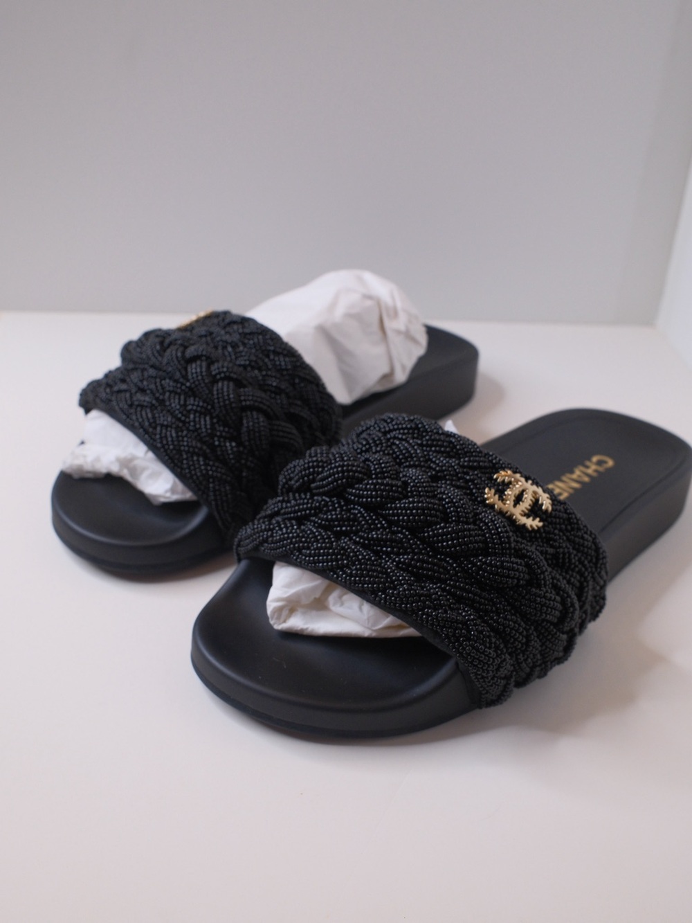 CHANEL Black Braided Slide Sandals with Gold CC Charm